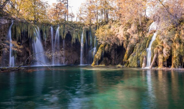 Waterfalls spilling into one of the Plitvice lakes